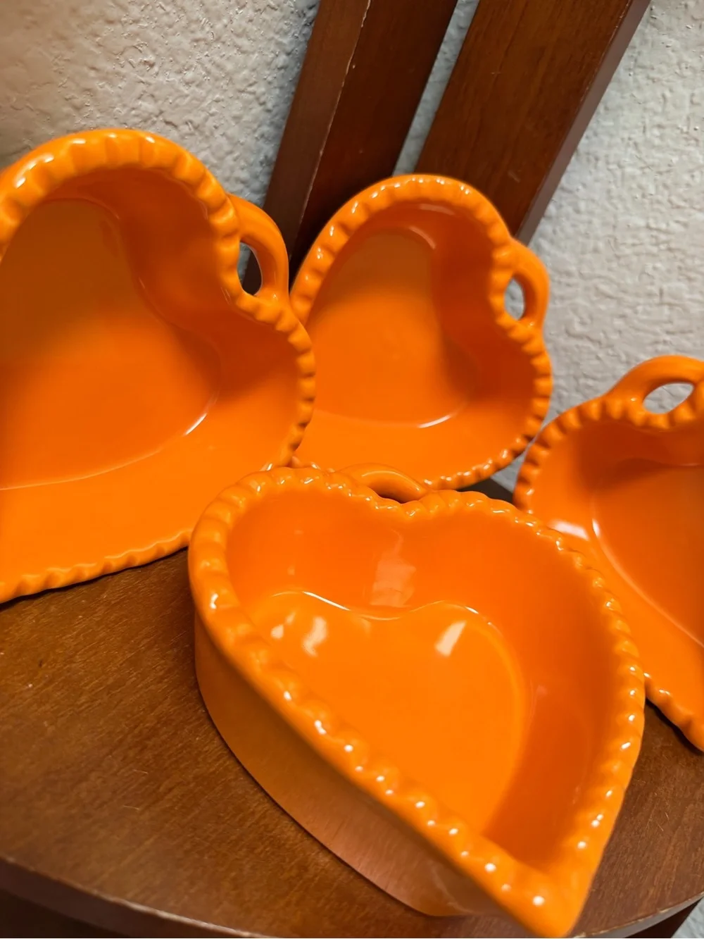 Williams-Sonoma Ceramic Heart-Shaped Dish  Set of 4 in a vibrant glossy orange.